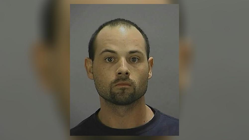 Man accused in murder taken into custody after SWAT situation